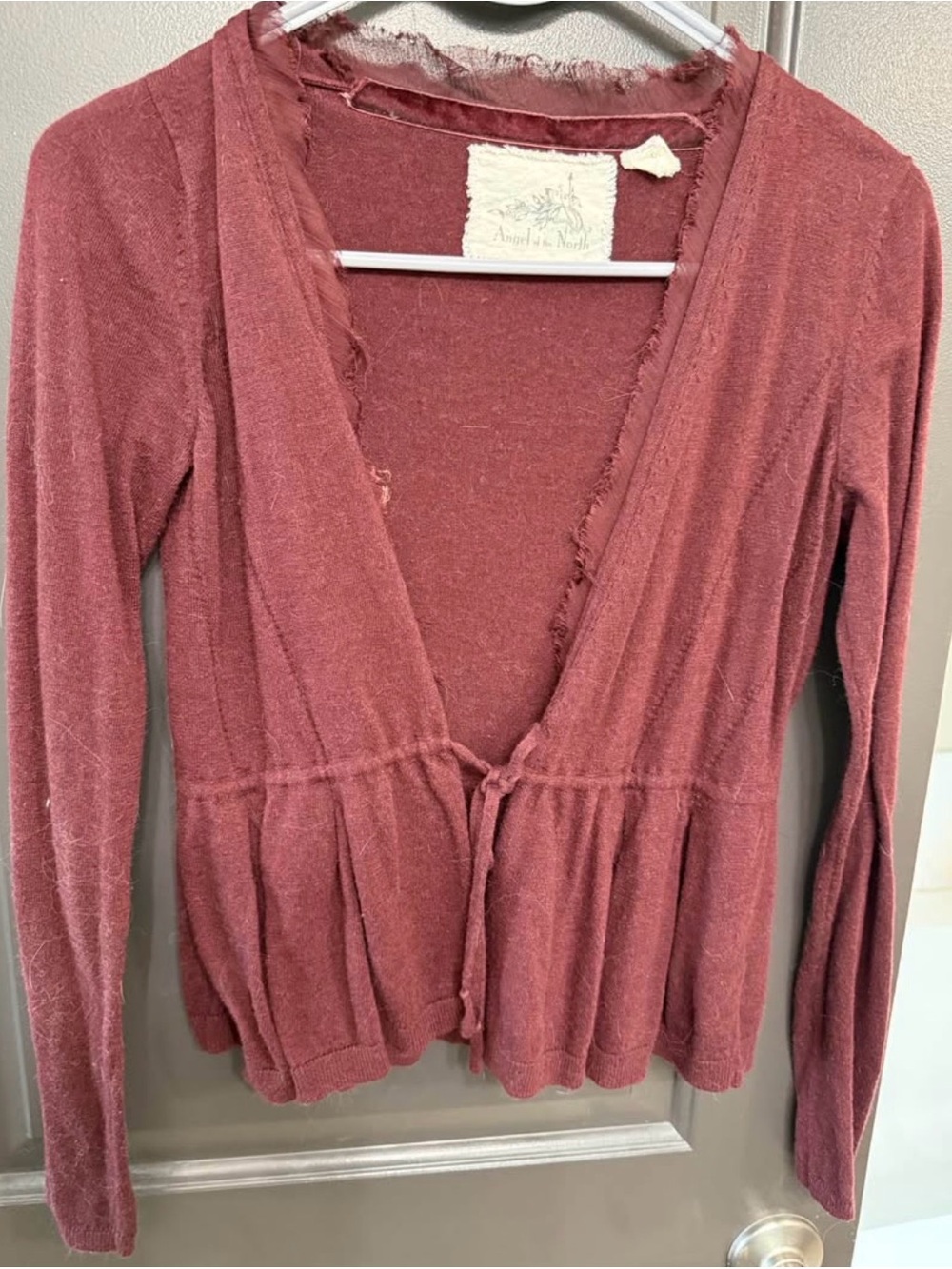 Angel Of The North burgandy raw edge peplum cardigan size small